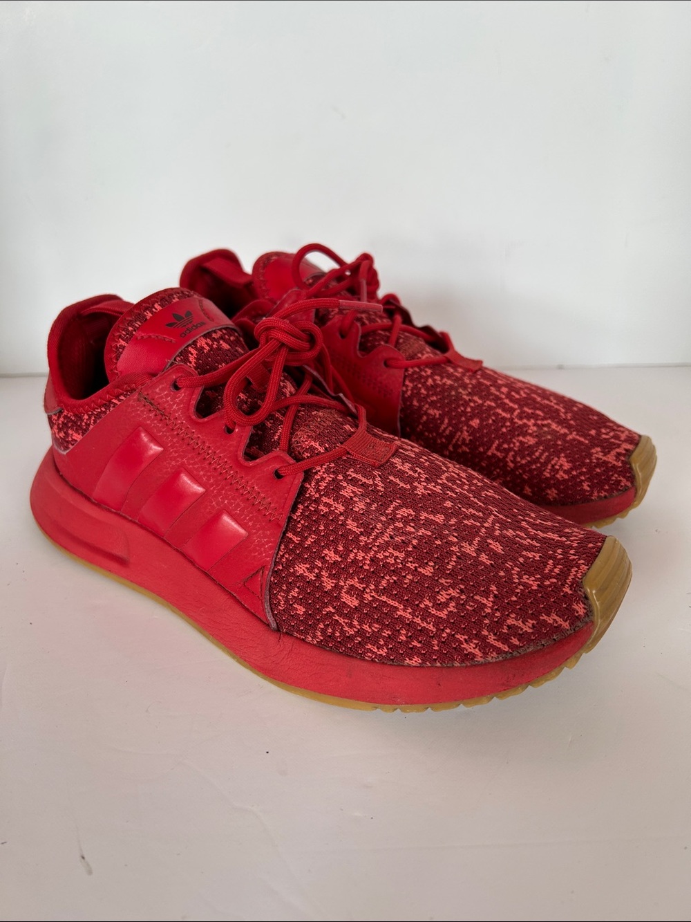 Adidas women’s Red Knit Sneakers with Gum Outsole
